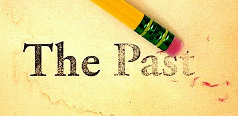 Pencil erasing "The Past" written on paper