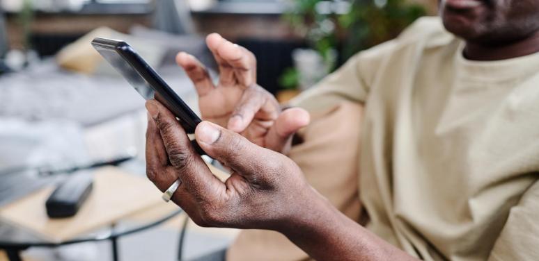 black man with phone