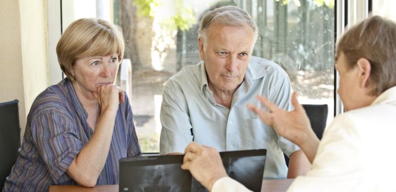 older couple looking at paperwork