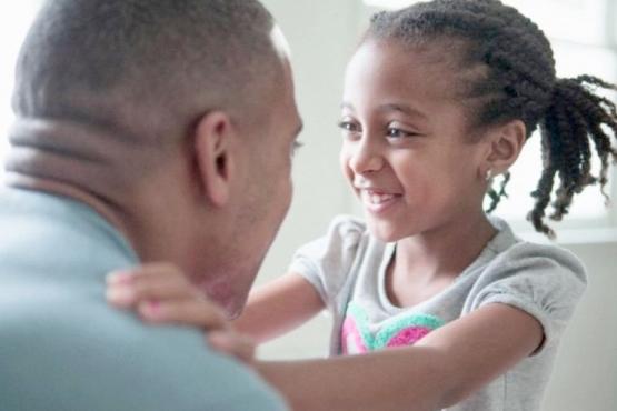 black dad and daughter