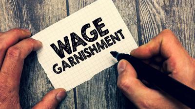 Debtor’s Paychecks are Protected in Kansas from Bank Garnishments Debtor’s Paychecks are Protected in Kansas from Bank Garnishments